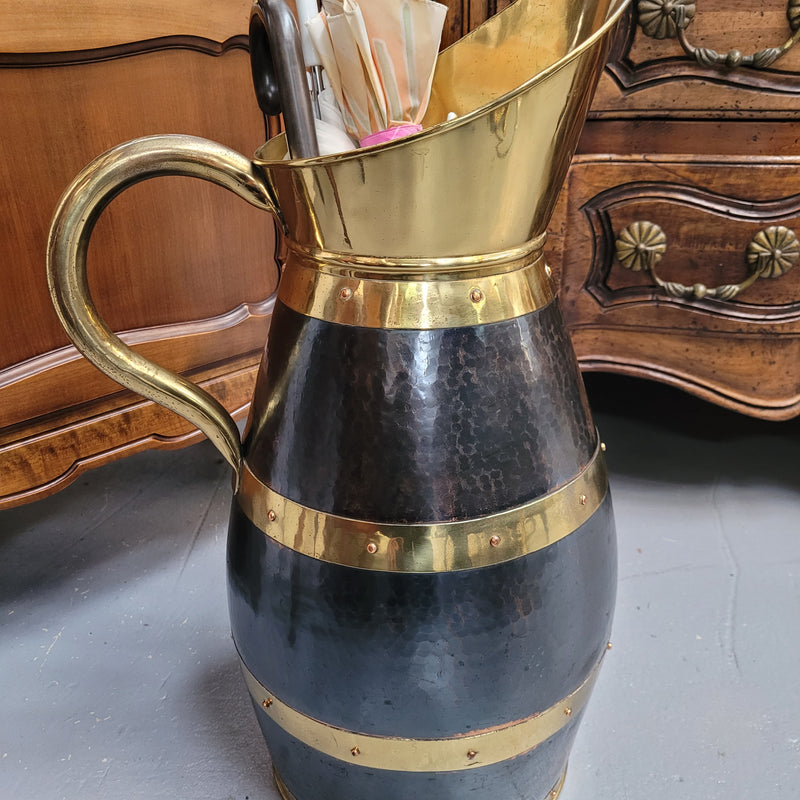 Large Antique copper and brass jug that could be used as an umbrella stand. Sourced from France and is in good original detailed condition. 