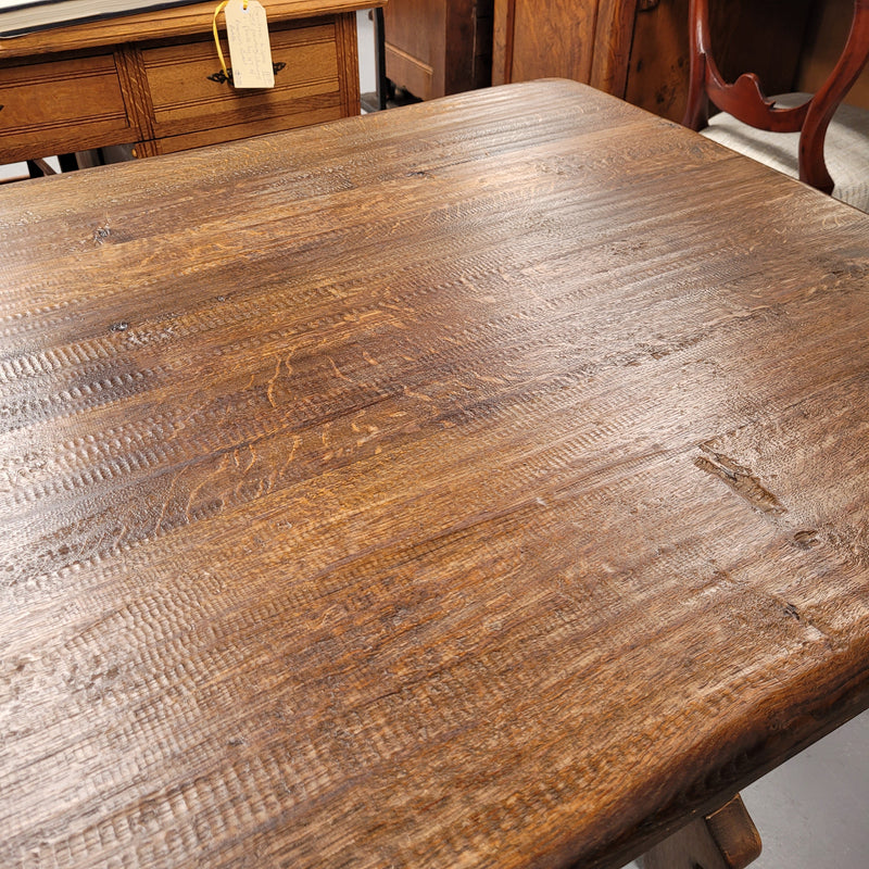 French Oak Spanish style farmhouse dining table with beautiful iron work underneath. It has been sourced from France and is in good original detailed condition.