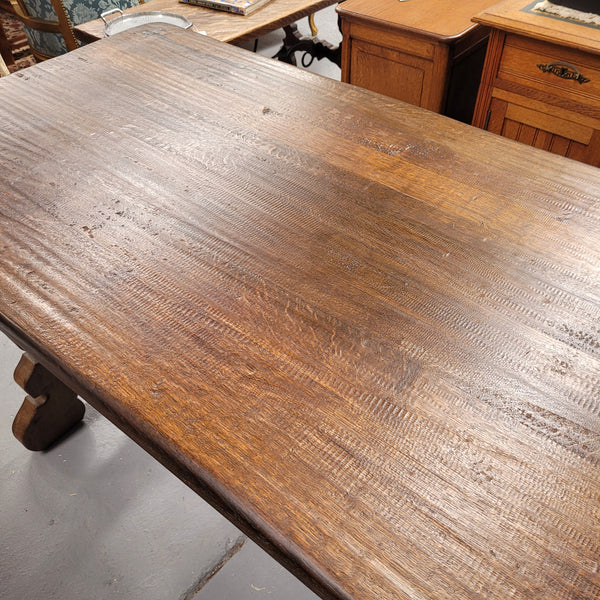 French Oak Spanish style farmhouse dining table with beautiful iron work underneath. It has been sourced from France and is in good original detailed condition.
