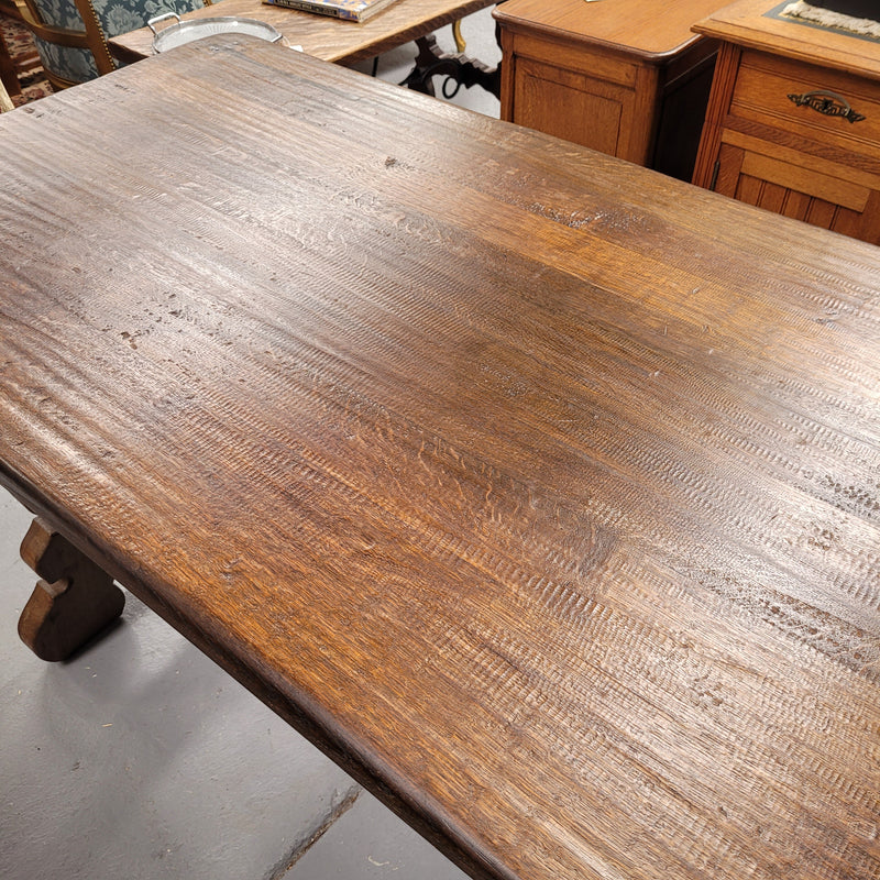 French Oak Spanish style farmhouse dining table with beautiful iron work underneath. It has been sourced from France and is in good original detailed condition.
