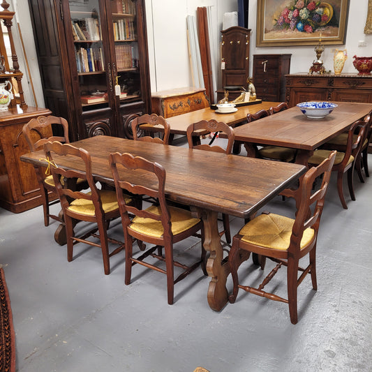 French Oak Spanish style farmhouse dining table with beautiful iron work underneath. It has been sourced from France and is in good original detailed condition. Table can seat six people very comfortably and could sit eight if required. 