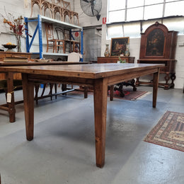 Vintage reclaimed French Oak farmhouse style dining table. It is 1 meter wide and 2.5 meters long this charming table comfortably seats 10. Made from thick Oak timber planks, It is in good original detailed condition. 