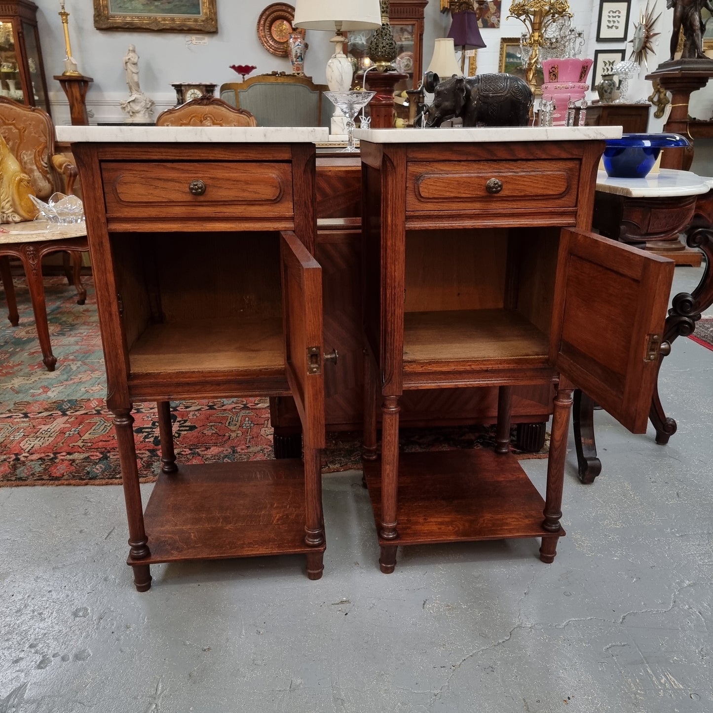 Pair of French Oak Henry II Style White Marble Top Bedside Cabinets