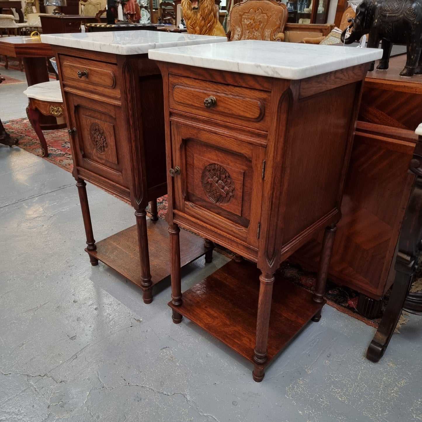 Pair of French Oak Henry II Style White Marble Top Bedside Cabinets