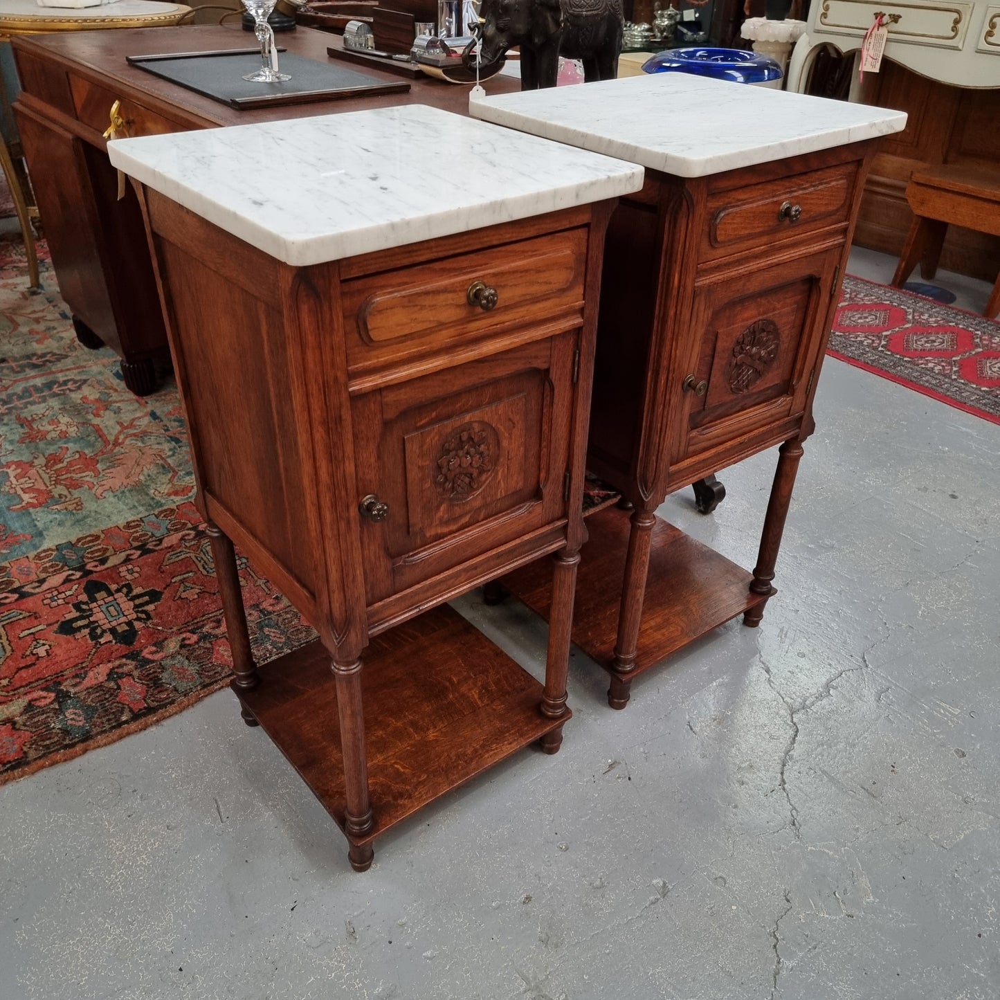 Pair of French Oak Henry II Style White Marble Top Bedside Cabinets