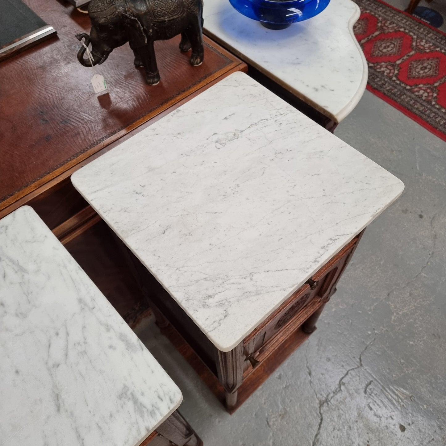 Pair of French Oak Henry II Style White Marble Top Bedside Cabinets