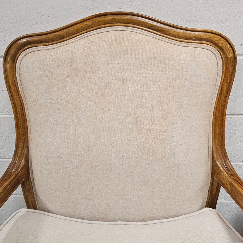 Pair of vintage Louis 15th style oak framed bergeres chairs with good size seats. making them very comfortable to sit in. The upholstery is in used condition with stains as shown in photos. Overall the timber frames are strong &amp; solid. They have been sourced directly from France. 