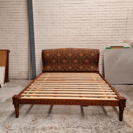 Vintage Empire style hard to find king Size bed with impressive tapestry upholstery. It comes with custom made bed slats ready to simple place your standard king size mattress on top. It is in good original detailed condition. The tapestry upholstery is in good condition and is upholstered on the back as well.