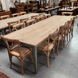 Bring the charm of rustic farmhouse style to your home with this handcrafted 3m Farmhouse style reclaimed Pine dining table. Seats 10 - 12 people. Material: Reclaimed Pine top and Reclaimed Pine base Colour: white washed and waxed natural timber top with Antique olive green base.