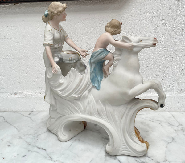 Beautiful Victorian bisque figurine group of a boy and lady riding a white horse. It is in good original condition. Please see photos as they form part of the description.