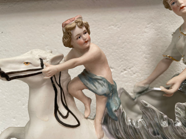 Beautiful Victorian bisque figurine group of a boy and lady riding a white horse. It is in good original condition. Please see photos as they form part of the description.