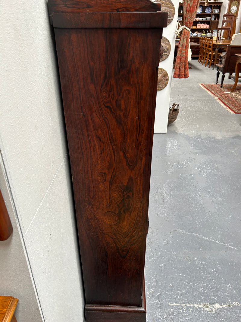 A very functional and highly desirable Rosewood Antique early 19th century free-standing breakfront bookcase. Shelves are adjustable, and trim is in great detailed condition.