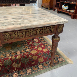 Impressive Louis XVI style walnut coffee table. Stunning marble top, gilt mounts and fluted legs. Circa: 1950's. In good original condition.