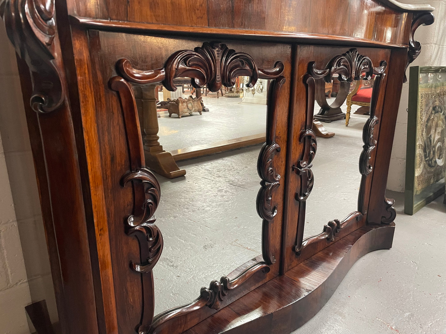 Antique English Rosewood marble top credenza. Featuring two beautiful mirrored doors and a lovely serpentine shaped front. Sourced locally and in good original detailed condition.