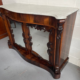 Antique English Rosewood marble top credenza. Featuring two beautiful mirrored doors and a lovely serpentine shaped front. Sourced locally and in good original detailed condition.