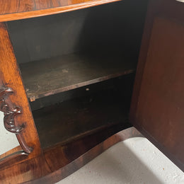 Antique English Rosewood marble top credenza. Featuring two beautiful mirrored doors and a lovely serpentine shaped front. Sourced locally and in good original detailed condition.