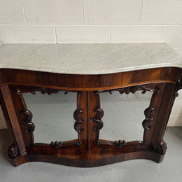 Antique English Rosewood marble top credenza. Featuring two beautiful mirrored doors and a lovely serpentine shaped front. Sourced locally and in good original detailed condition.