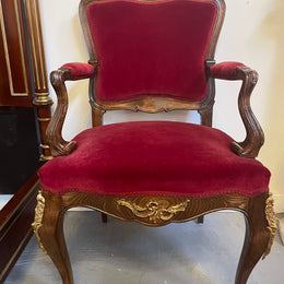 Louis XV style French Walnut armchair/desk chair with red valet upholstery. Fabric is in good condition with some signs of use and features beautiful decorative mounts. It has been sourced from France and is in good original detailed condition. 