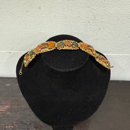 Vintage Muti Stone Bracelet On A Gilt Metal Filigree Base.