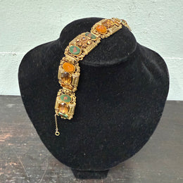 Vintage Muti Stone Bracelet On A Gilt Metal Filigree Base.