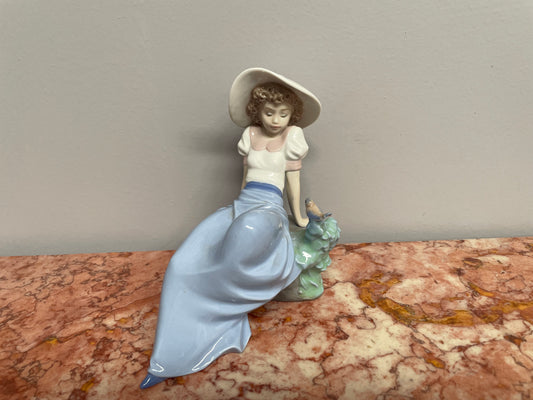 Nao Girl With Bird Figurine