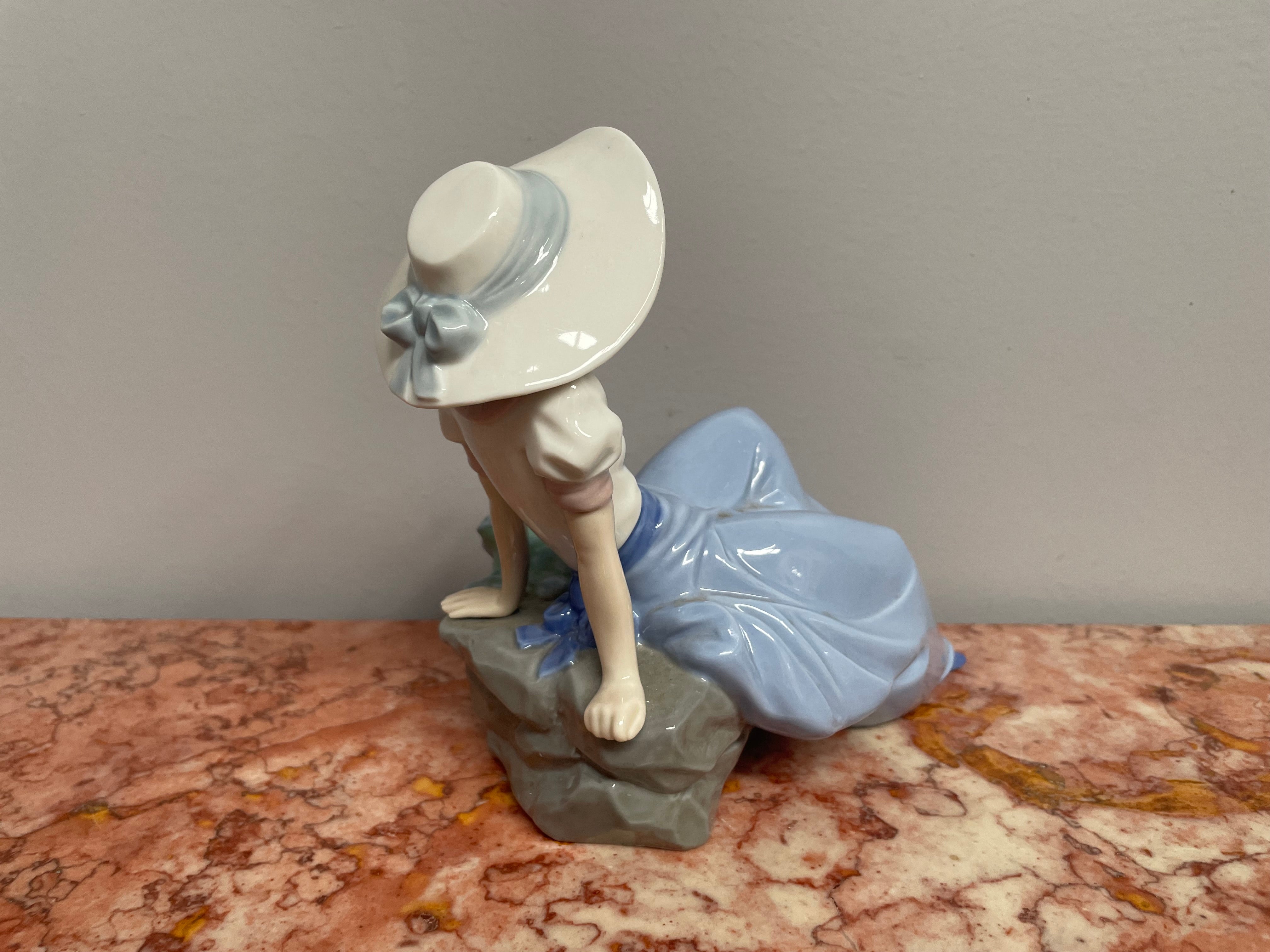 Nao Girl With Bird Figurine
