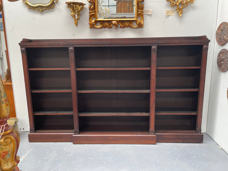 A very functional and highly desirable Rosewood Antique early 19th Century free-standing breakfront bookcase. Shelves are adjustable and trim is in great detailed condition.