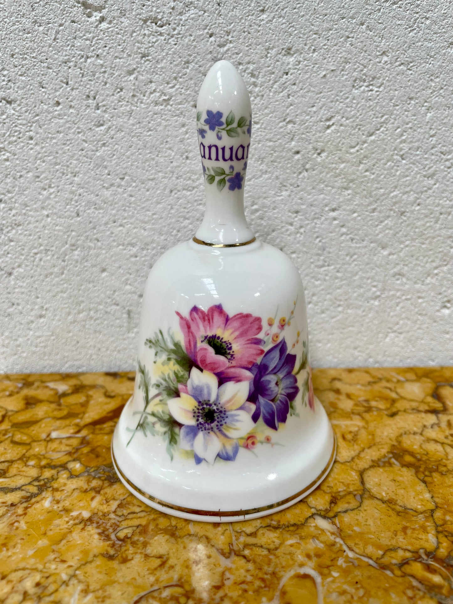 Lovely fine bone China Monthly Flower 'January' bell, made in Taiwan. It is in good original condition.