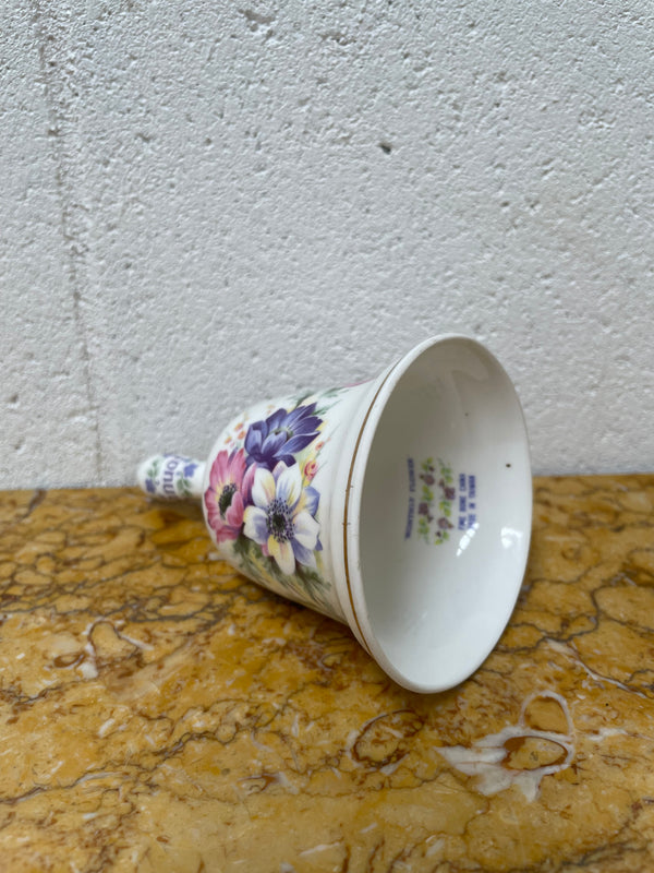 Lovely fine bone China Monthly Flower 'January' bell, made in Taiwan. It is in good original condition.