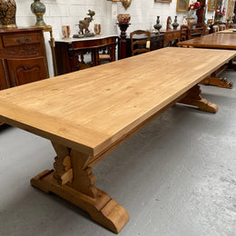 Impressive vintage reclaimed spruce dining table of large proportions. It is in the monastery style with a practical wax finish. Seats 12 persons comfortably and would be great for entertaining. In excellent condition. Please see photos as they form part of the description and condition.