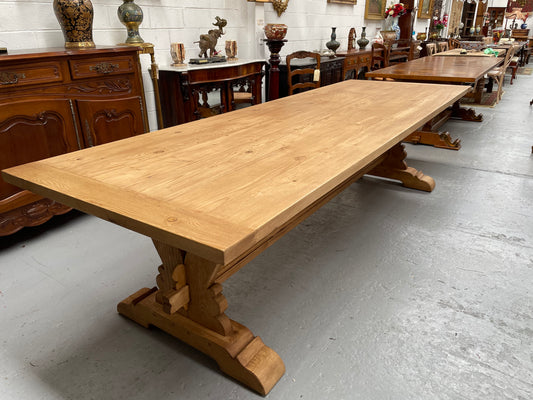 Impressive vintage reclaimed spruce dining table of large proportions. It is in the monastery style with a practical wax finish. Seats 12 persons comfortably and would be great for entertaining. In excellent condition. Please see photos as they form part of the description and condition.