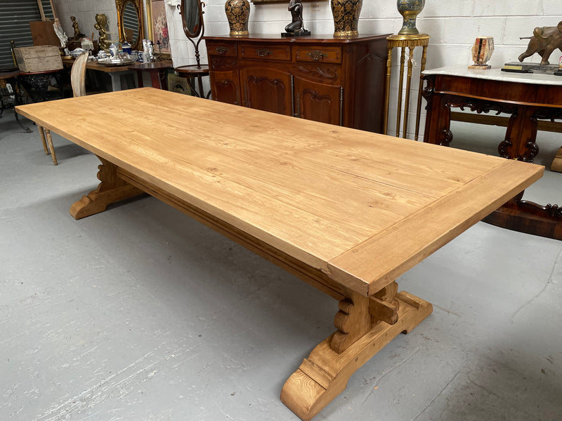 Impressive vintage reclaimed spruce dining table of large proportions. It is in the monastery style with a practical wax finish. Seats 12 persons comfortably and would be great for entertaining. In excellent condition. Please see photos as they form part of the description and condition.