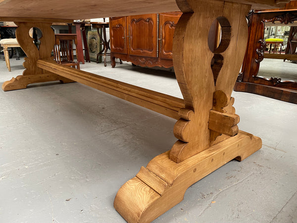 Impressive vintage reclaimed spruce dining table of large proportions. It is in the monastery style with a practical wax finish. Seats 12 persons comfortably and would be great for entertaining. In excellent condition. Please see photos as they form part of the description and condition.