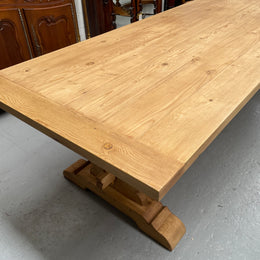 Impressive vintage reclaimed spruce dining table of large proportions. It is in the monastery style with a practical wax finish. Seats 12 persons comfortably and would be great for entertaining. In excellent condition. Please see photos as they form part of the description and condition.