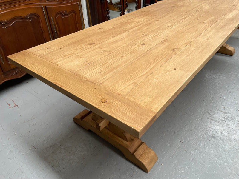 Impressive vintage reclaimed spruce dining table of large proportions. It is in the monastery style with a practical wax finish. Seats 12 persons comfortably and would be great for entertaining. In excellent condition. Please see photos as they form part of the description and condition.