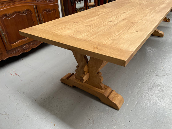 Impressive vintage reclaimed spruce dining table of large proportions. It is in the monastery style with a practical wax finish. Seats 12 persons comfortably and would be great for entertaining. In excellent condition. Please see photos as they form part of the description and condition.