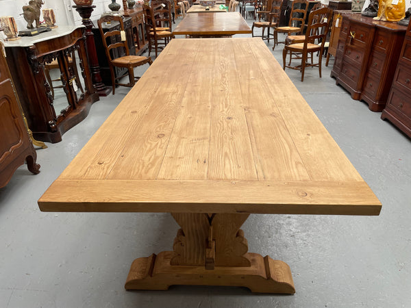 Impressive vintage reclaimed spruce dining table of large proportions. It is in the monastery style with a practical wax finish. Seats 12 persons comfortably and would be great for entertaining. In excellent condition. Please see photos as they form part of the description and condition.