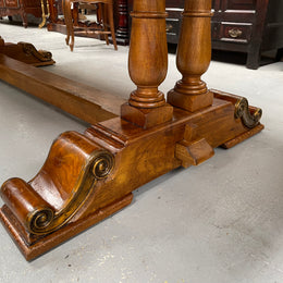 Vintage reclaimed Mahogany parquetry top monastery style dining table. It features beautiful brass mounts on the feet of the table and is in good original detailed condition. It can comfortably seat eight people. 