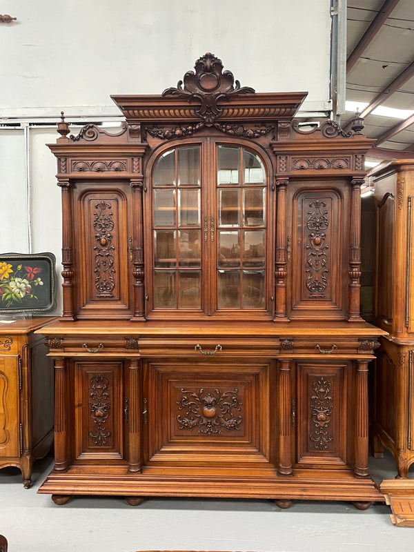 French Walnut Renaissance style 19th Century buffet /sideboard of grand proportions. It is beautifully carved and in very good original de