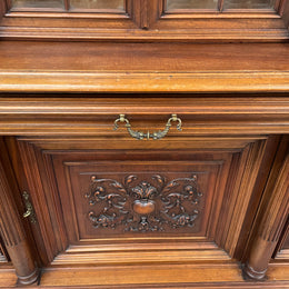 French Walnut Renaissance style 19th Century buffet /sideboard of grand proportions. It is beautifully carved and in very good original de