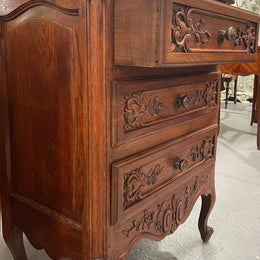 Beautiful French oak Louis XV style carved chest of three drawers with lovely details and in good original detailed condition. Sourced from France.