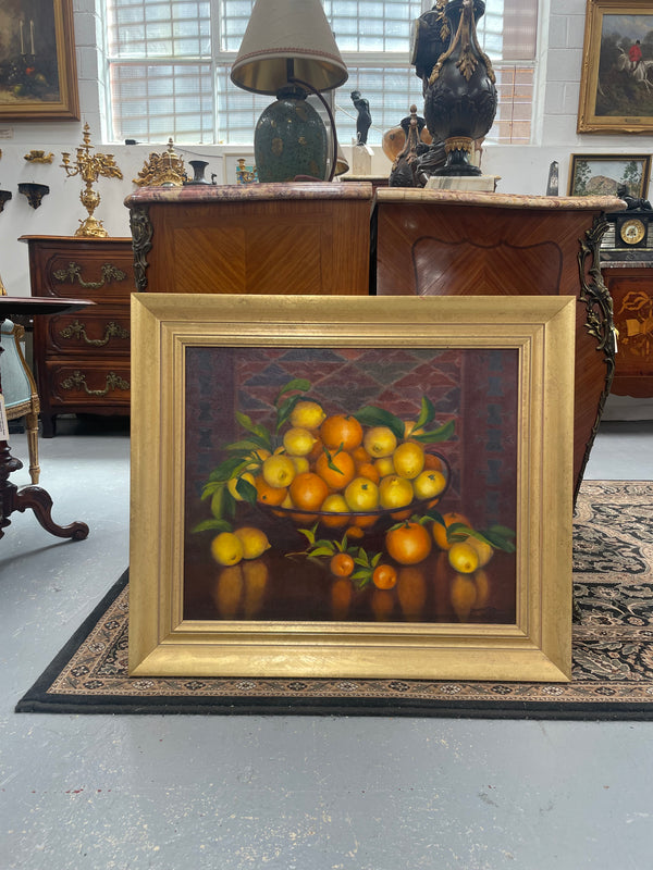 Beautiful original oil on board painting of lemons and oranges. It is framed in a lovely simple gold frame and ready to hang. Signed by artist. Please see all photos as they form part of the description and condition.