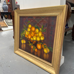 Beautiful original oil on board painting of lemons and oranges. It is framed in a lovely simple gold frame and ready to hang. Signed by artist. Please see all photos as they form part of the description and condition.