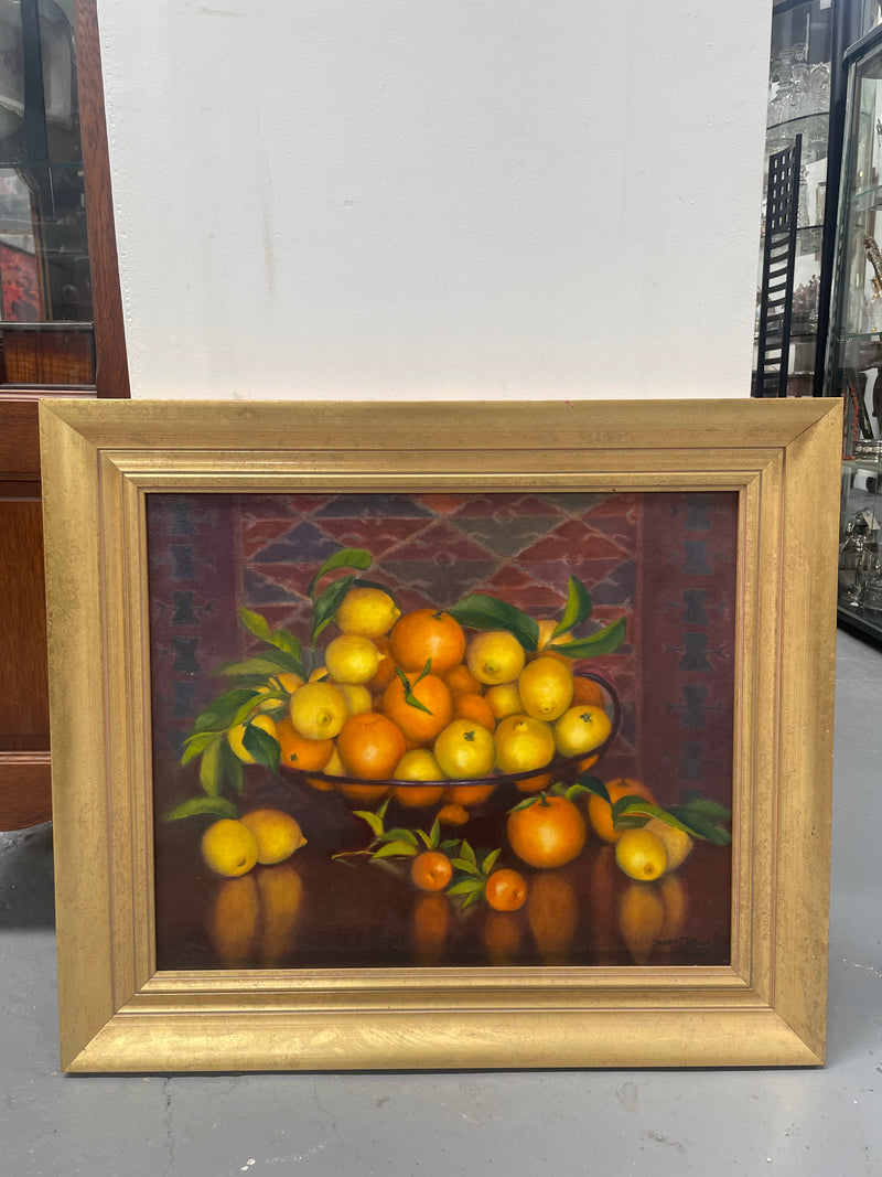 Beautiful original oil on board painting of lemons and oranges. It is framed in a lovely simple gold frame and ready to hang. Signed by artist. Please see all photos as they form part of the description and condition.