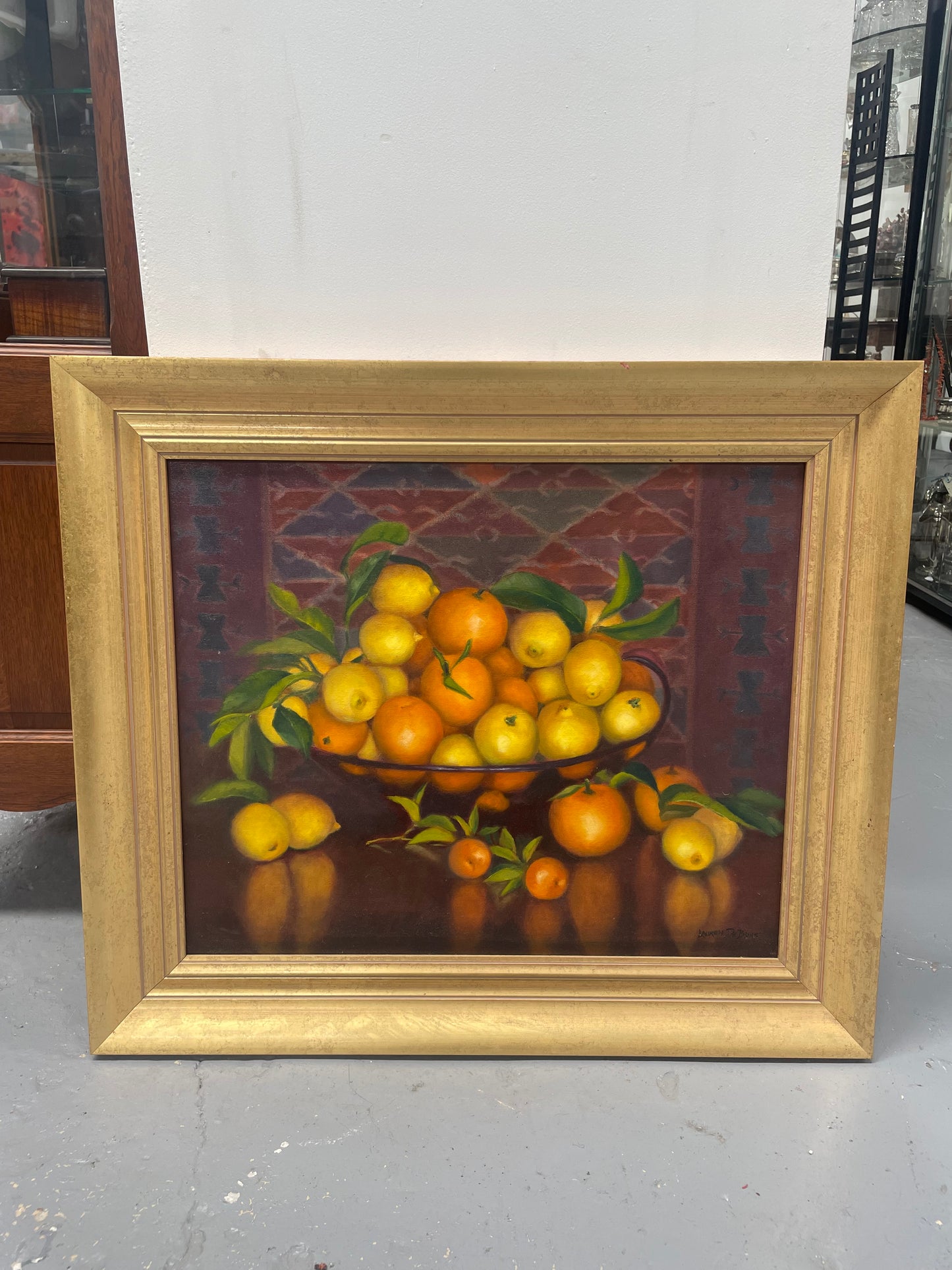 Beautiful original oil on board painting of lemons and oranges. It is framed in a lovely simple gold frame and ready to hang. Signed by artist. Please see all photos as they form part of the description and condition.