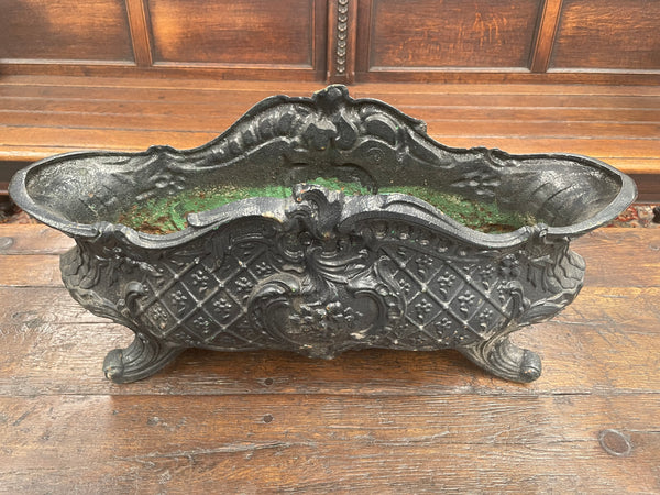 Highly decorative 19th Century French cast iron planter box with beautiful details. there are two matching pots available price is for one. They have been sourced directly from France and are in good original condition. 