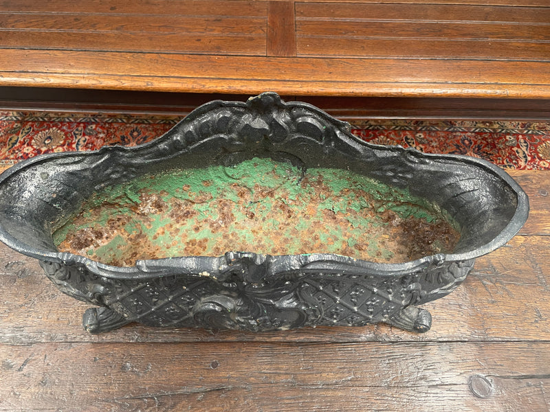 Highly decorative 19th Century French cast iron planter box with beautiful details. there are two matching pots available price is for one. They have been sourced directly from France and are in good original condition. 