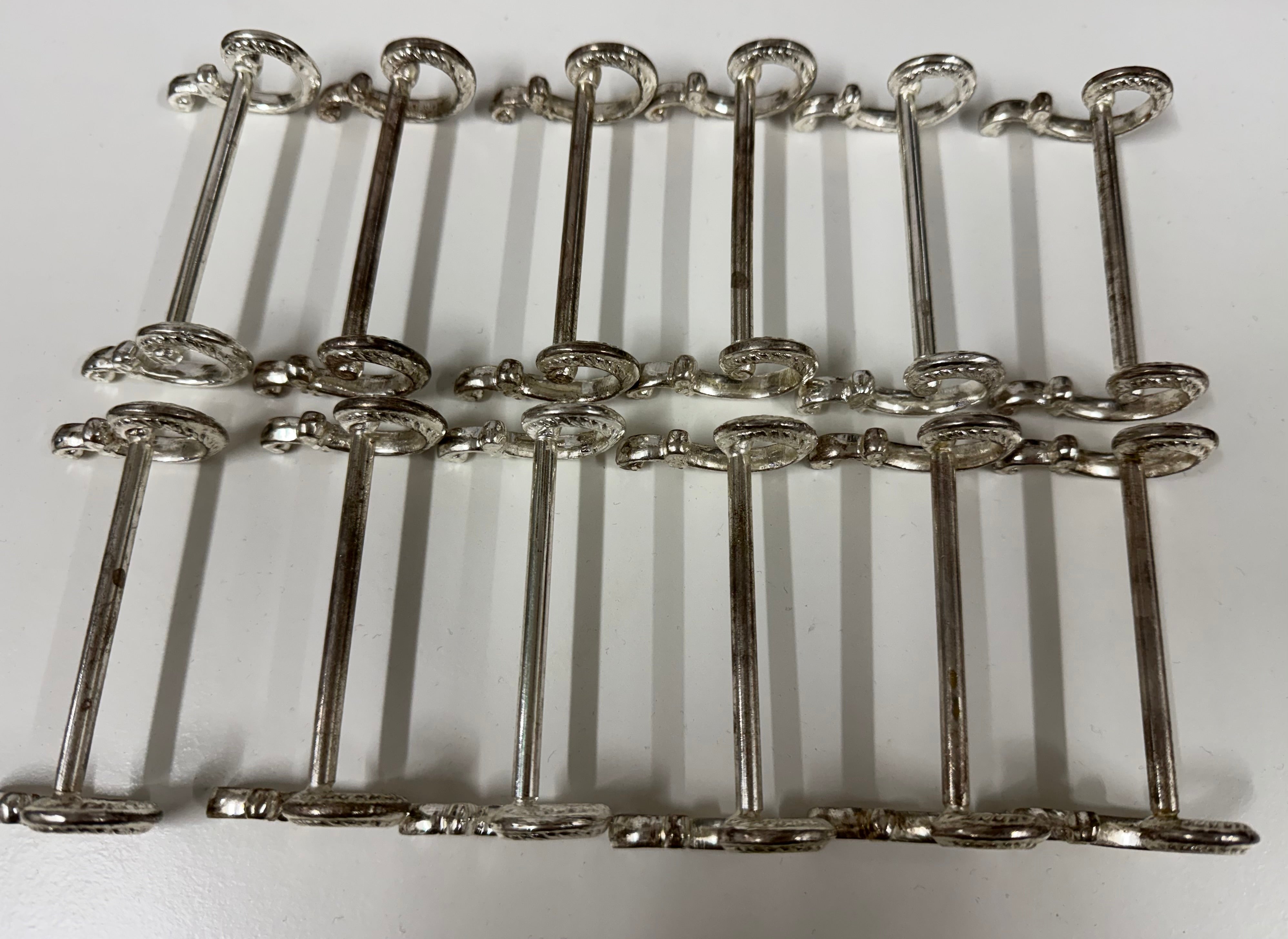Vintage Set of 12 Silver Plate Knife Rests By 'Golden'