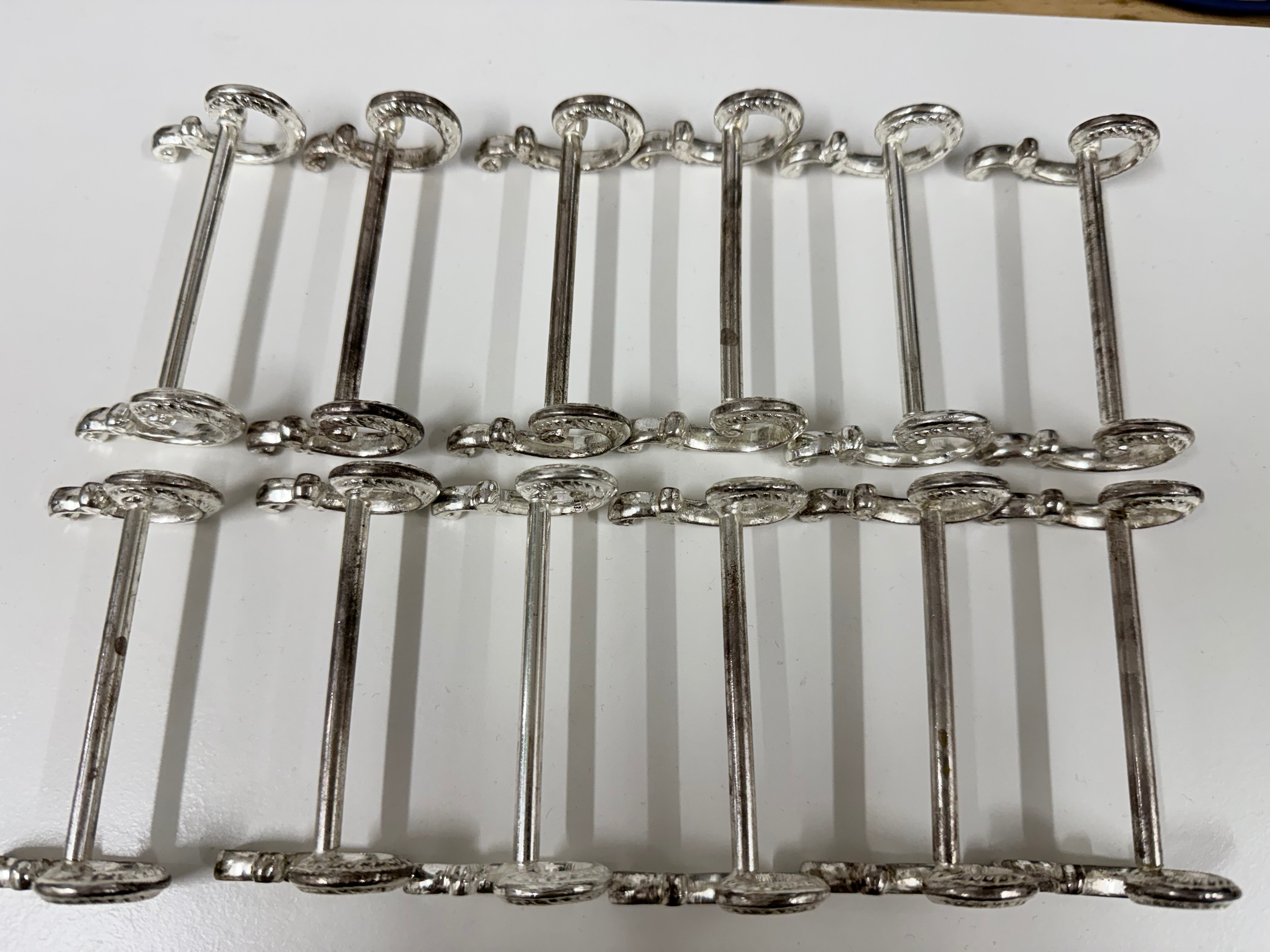 Vintage Set of 12 Silver Plate Knife Rests By 'Golden'