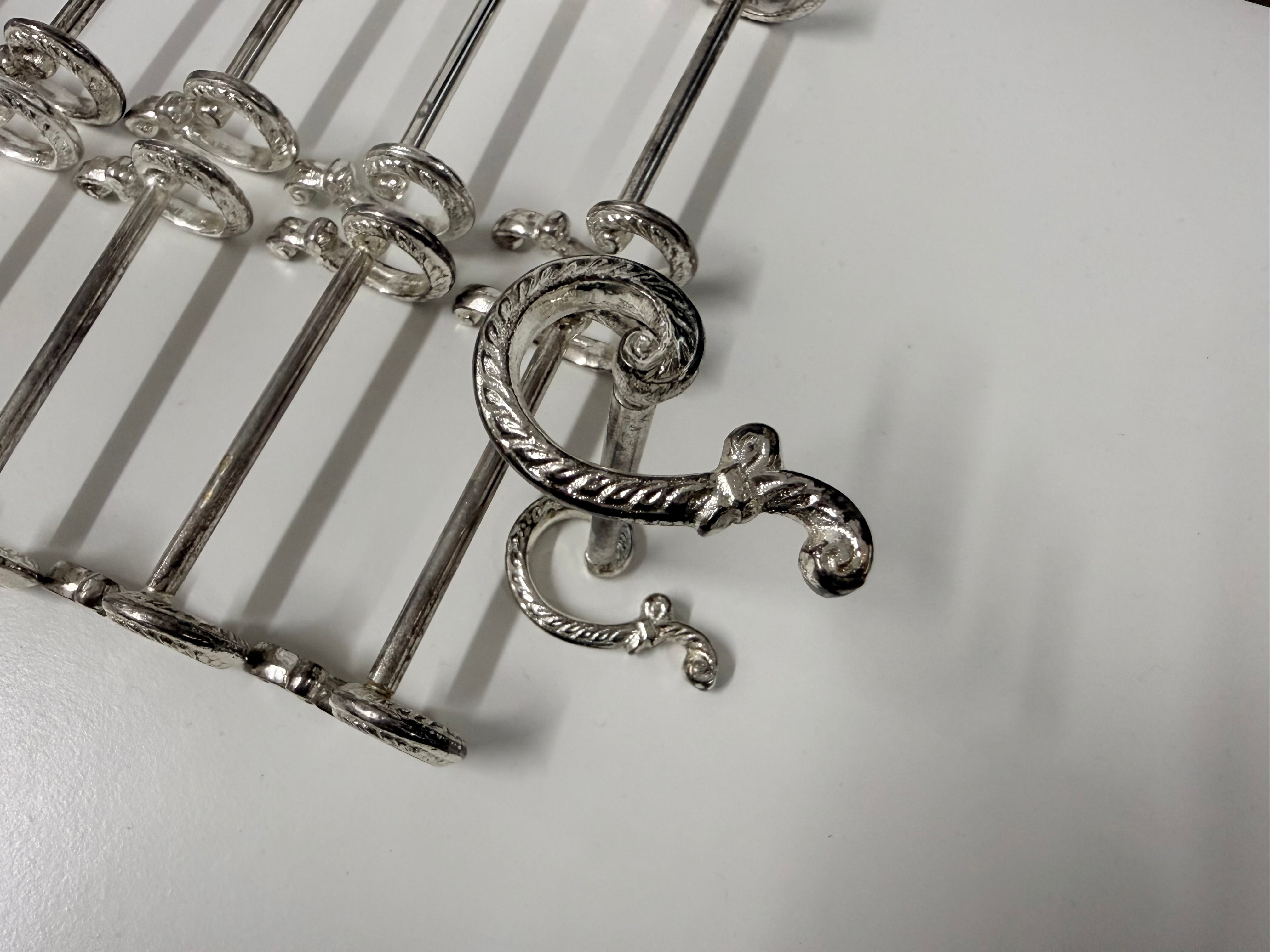 Vintage Set of 12 Silver Plate Knife Rests By 'Golden'